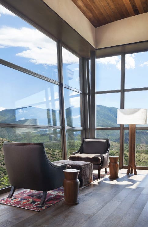 Expansive custom wood windows by Veranda View allow for breathtaking views of Aspen.