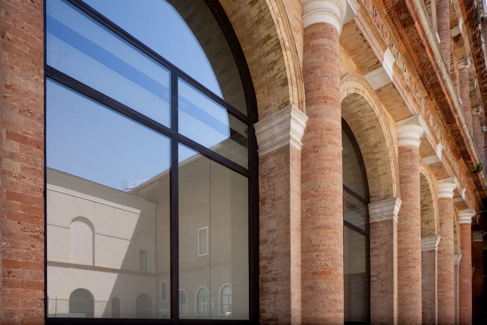 Minimal frame thermally broken burnished brass window systems by Brombal were chosen for the restoration of Gallerie Dell'accademia