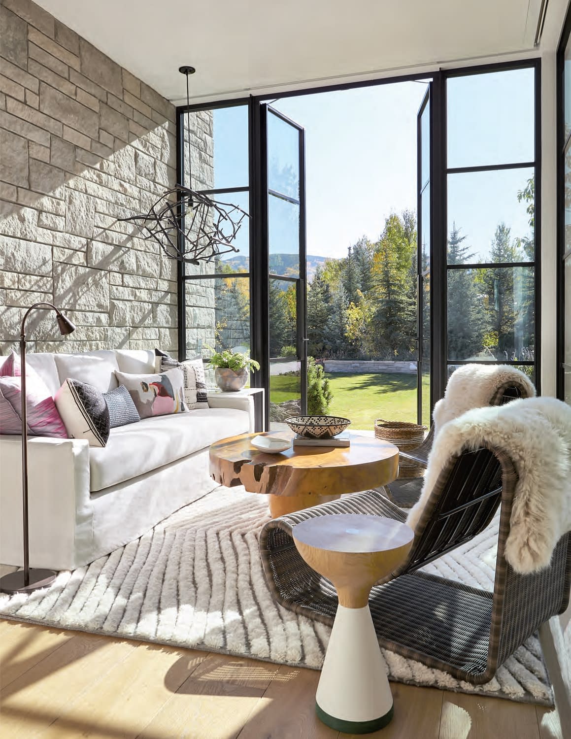 Thermally broken outswing steel doors open the sitting room to breath taking views of Aspen, Colorado