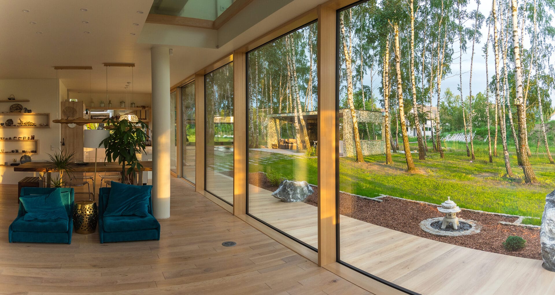 The back of this house features Pinus' Total Glass sliding door and windows