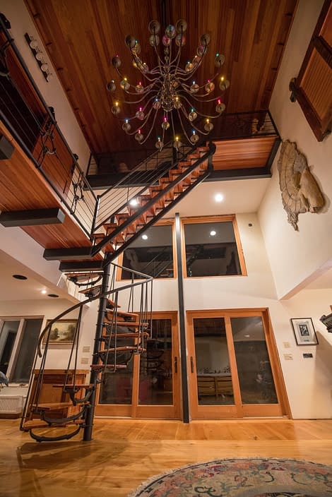 A three level iron and wood custom staircase