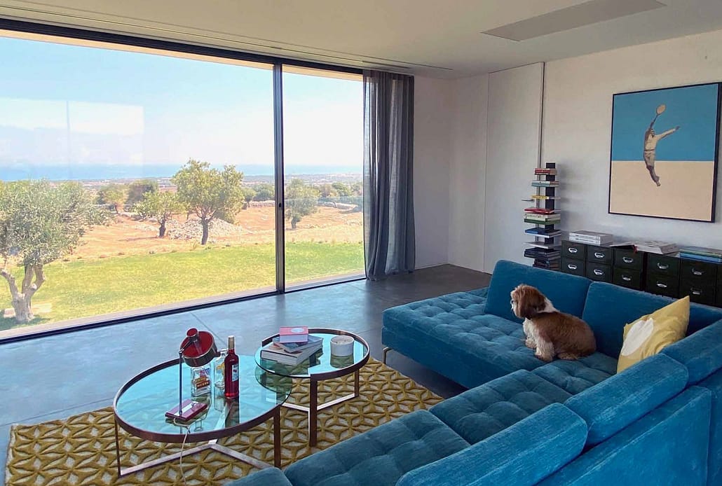A minimal frame aluminum window and sliding door from Contempo Vista allows everyone to sit back and enjoy the magnificent views
