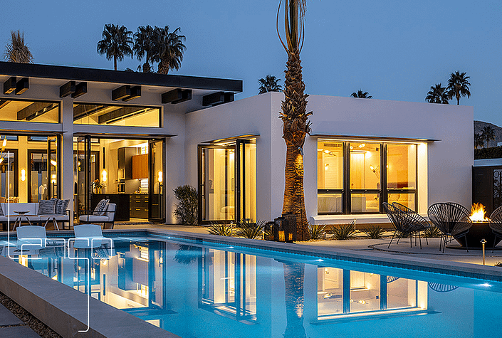 This beautiful Palm Springs villa is complete with SPI's Alu Space large aluminum windows and double-leaf pivot doors