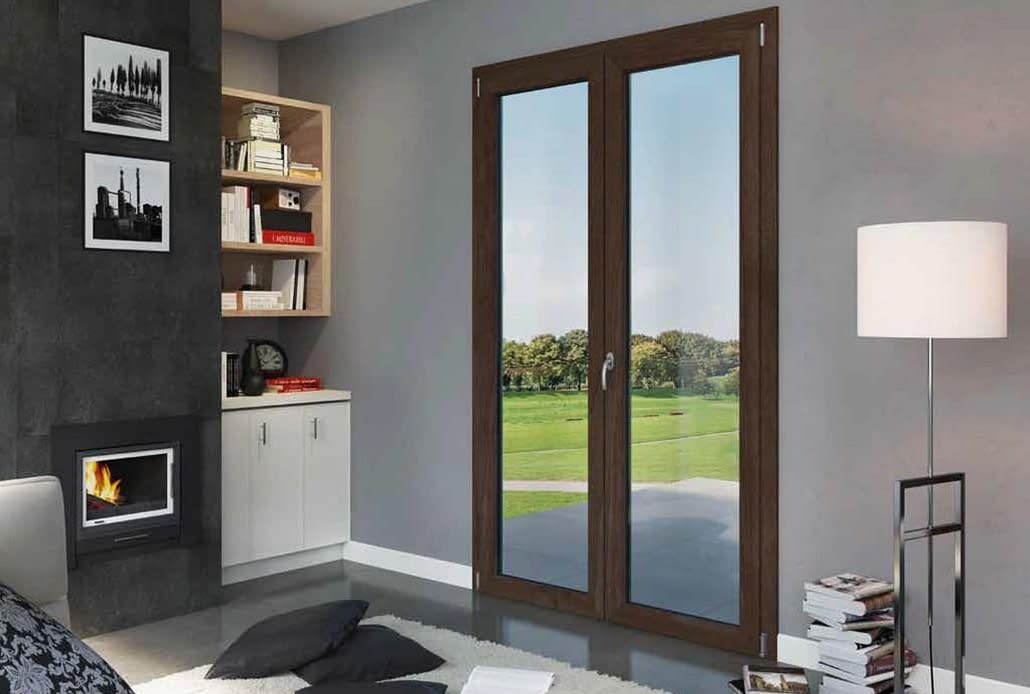 A double inswing door made of eco-friendly and energy efficient PVC opens up to a patio