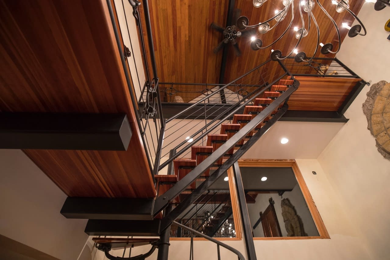 multi level iron and wood staircase