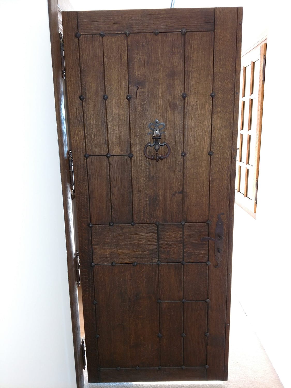 A custom wood with iron accents entryway door