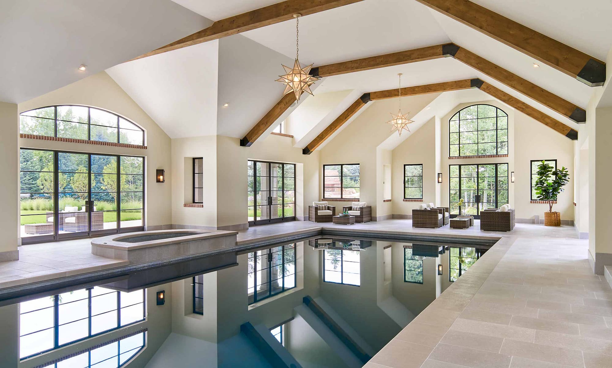 Brombal's custom luxury metal windows and doors are featured in this indoor pool