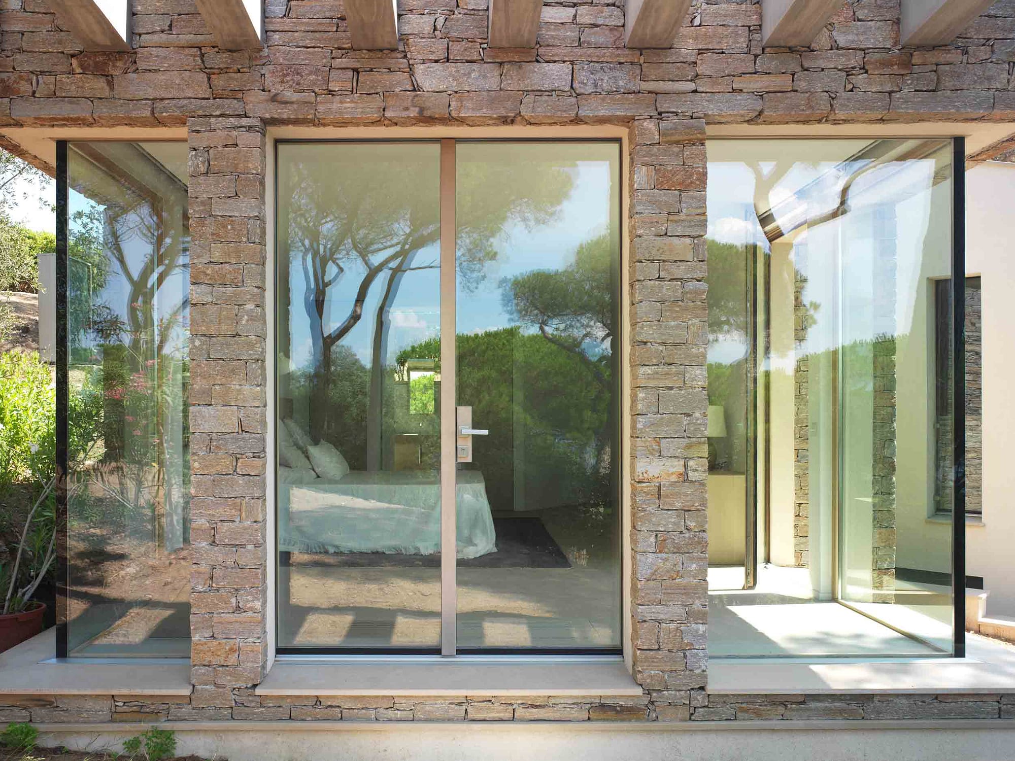 A custom minimal frame entrance door by Carminati from Veranda View