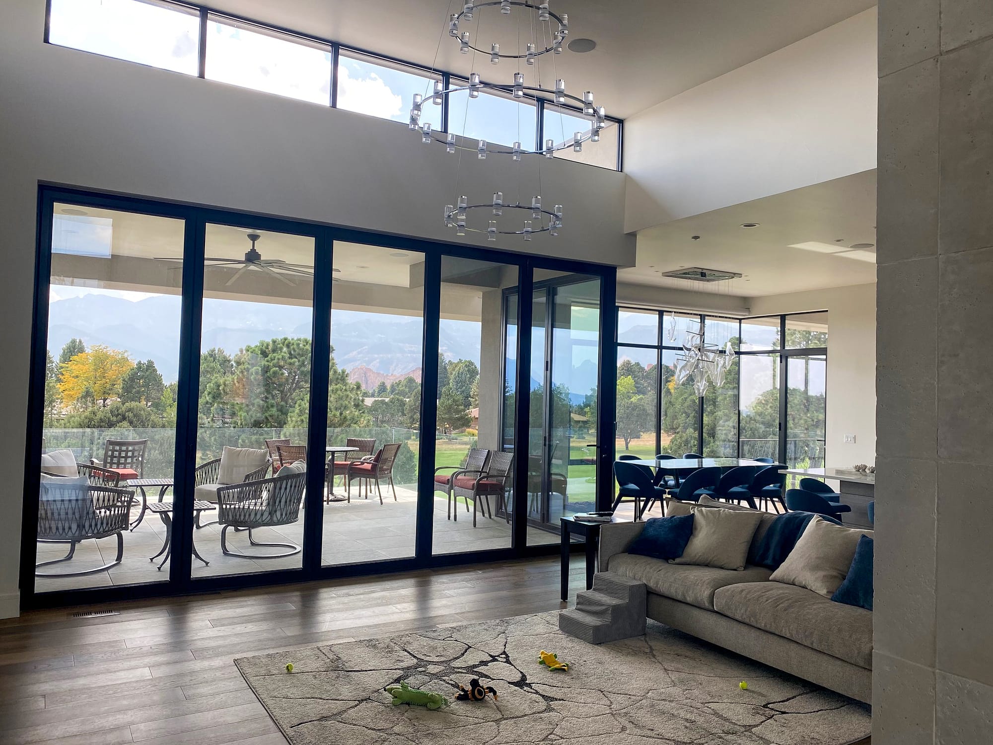 A minimal frame aluminum folding door, curtain wall and swing door allow for this Colorado home to enjoy 365 days of sunshine.